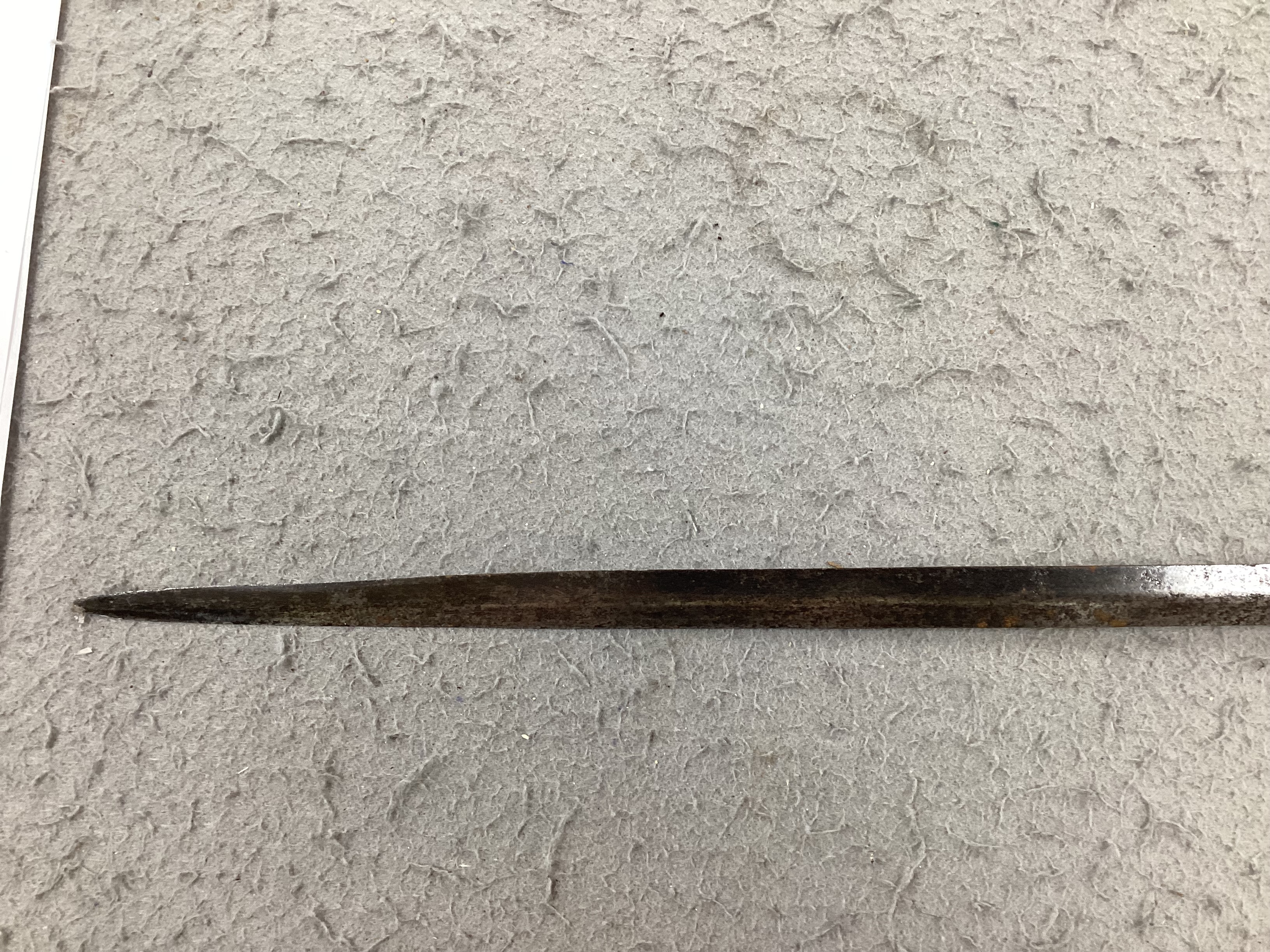 A swept hilt rapier, c.1620, blade fullered at the forte, iron guard of conventional form with later pommel and wooden grip, blade 113cm